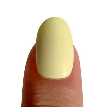 Tira de uñas de gel amarillo cremoso